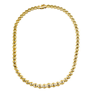 Vintage 14k yellow gold hexagon shaped graduated brushed finish necklace set with 5.51 carats of round brilliant earth-mined diamonds.