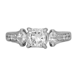 Vintage 18k white gold engagement ring set with 1.01 carats princess earth-mined diamond plus 0.56 carats princess earth-mined diamonds on the sides plus 0.50 carats round brilliant earth-mined diamonds in the band.