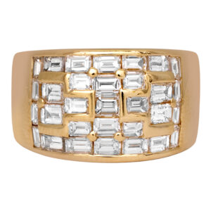 Vintage 18k yellow gold band set with 2.82 carats of earth-mined baguette diamonds.