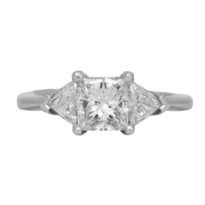 Vintage 14k white gold three-stone engagement ring set with a 1.08 carat princess cut center diamond plus 2.00 carats of trillion cut diamonds.