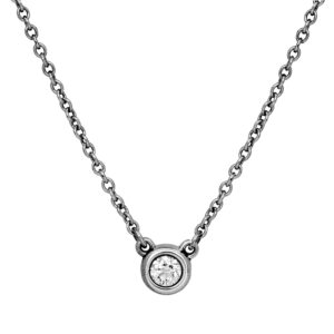 Vintage sterling silver Tiffany & Co. Elsa Peretti diamonds by the yard necklace set with a 0.12 carat round brilliant earth-mined diamond on a 16” chain.