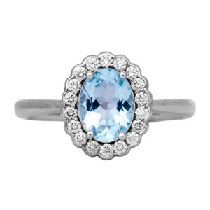 Vintage 14k white gold ring set with a 1.00 carat oval aquamarine plus 0.25 carats of round brilliant earth-mined diamonds in the halo.