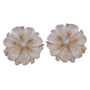 Vintage 14k yellow gold stud earrings set with a mother of pearl flower and 0.06 carats of round brilliant earth-mined diamonds.