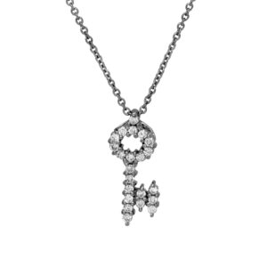 Vintage 18k white gold Roberto Coin Tiny Treasures key pendant necklace set with 0.13 carats of round brilliant cut earth-mined diamonds on an 18” cable chain.