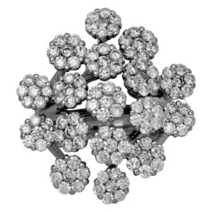 Vintage 14k white gold flower cluster ring set with 5.95 carats of round brilliant cut earth-mined diamonds.