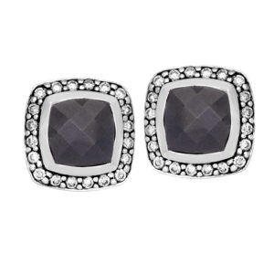 Vintage sterling silver David Yurman Albion stud earrings set with black onyx plus 0.20 carats earth-mined round brilliant diamonds with friction backs.