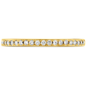 New 18k yellow gold Hearts On Fire Signature band set with 0.05 carats of round brilliant earth-mined diamonds.