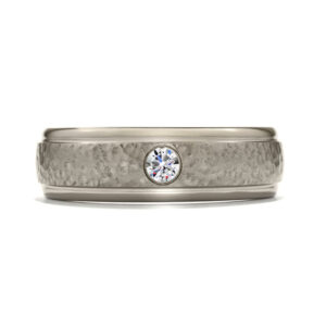 New grey titanium Hearts On Fire Commanding Grey hammered finish band set with 0.11 carats of round brilliant earth-mined diamonds.