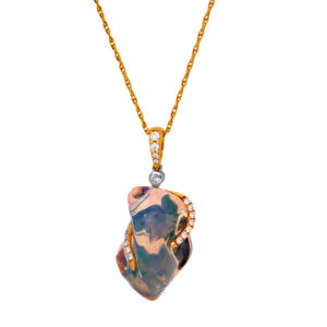 New 14k yellow and white gold Denny Wong drop pendant set with a 9.16 carat freeform opal plus 0.02 carats of tanzanite plus 0.11 carats of round brilliant earth-mined diamonds.