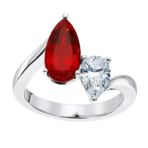 New 14k white gold Chatham Moi et Toi ring set with a 2.56 carat pear cut lab-grown ruby plus 0.77 carats of pear cut lab-grown diamonds.