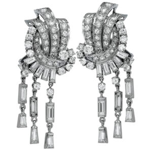 Vintage 14k white gold dangle earrings set with 2.50 carats of round brilliant, old European cut, single cut, and baguette diamonds.