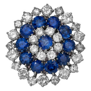 Vintage platinum three row halo cocktail ring set with 3.00 carats of round brilliant sapphire plus 2.30 carats of round brilliant diamonds.