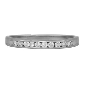 Vintage 18k white gold Kwiat band set with 0.35 carats of round brilliant earth-mined diamonds.