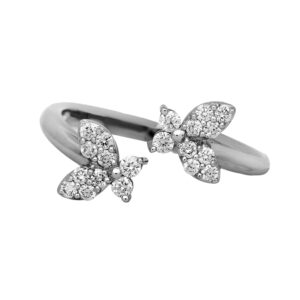 Vintage 14k white gold open shank butterfly ring set with 0.36 carats of round brilliant earth-mined diamonds.