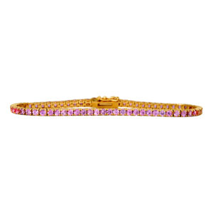 Vintage 14k yellow gold tennis bracelet set with 4.87 carats of round brilliant pink sapphires.