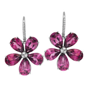 Vintage 18k white gold flower dangle earrings set with 6.10 carats of pear garnets plus 0.12 carats of round brilliant earth-mined diamonds.