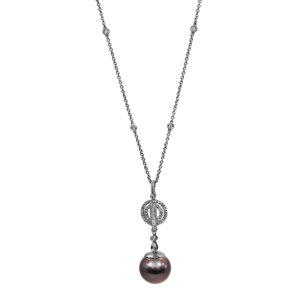Vintage 14k white gold drop pendant set with a Tahitian pearl plus 0.94 carats of round brilliant and baguette cut earth-mined diamonds on an 18" cable chain.