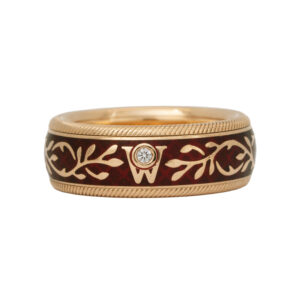 Vintage 18k yellow gold Wellendorff Hibiscus band set with a 0.02 carat round brilliant diamond.