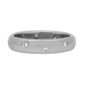 Vintage platinum Tiffany & Co. Elsa Peretti Etoile band set with 0.20 carats of round brilliant earth-mined diamonds.
