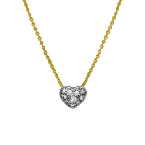Vintage 14k yellow and white gold heart necklace set with 0.20 carats of round brilliant earth-mined diamonds.