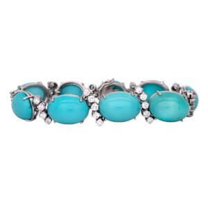 Vintage 18k white gold bracelet set with 70.00 carats of oval turquoise plus 4.40 carats of round brilliant earth-mined diamonds.