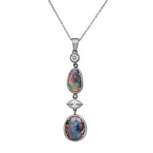 Vintage platinum brushed drop necklace set with 3.92 carats of Australian Lightning Ridge opals plus 0.55 carats of round brilliant and marquise earth-mined diamonds on an 18" chain.