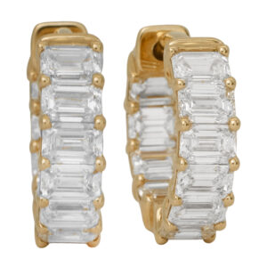 New 14k yellow gold huggie hoop earrings set with 3.13 carats of emerald cut lab-grown diamonds.