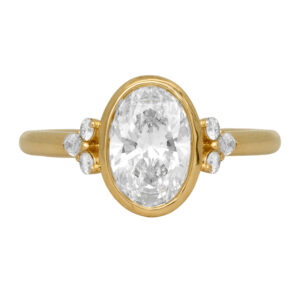 New 14k yellow gold engagement ring set with a 2.20 carat oval lab-grown diamond plus 0.17 carats of marquise and round brilliant lab-grown diamonds.