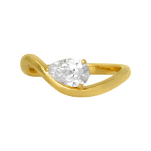 New 14k yellow gold curved ring set with a 0.78 carat pear lab-grown diamond. In an “east-west” setting, the center diamond is set horizontally across the finger rather than the traditional “north-south” orientation. Especially effective for elongated shapes such as oval, marquise, and emerald cuts.
