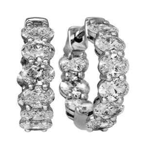 New 14k white gold huggie hoop earrings set with 3.14 carats of oval lab-grown diamonds.