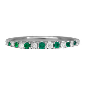 New 14k white gold alternating band set with 0.14 carats of round brilliant earth-mined diamonds and 0.12 carats of round brilliant emeralds.