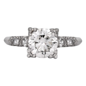 Antique platinum ring set with a 1.50 carat old European cut earth-mined diamond plus 0.16 carats of single cut earth-mined diamonds.