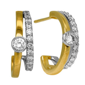 New 14k yellow and white gold huggie hoop earrings set with 0.68 carats of round brilliant earth-mined diamonds.