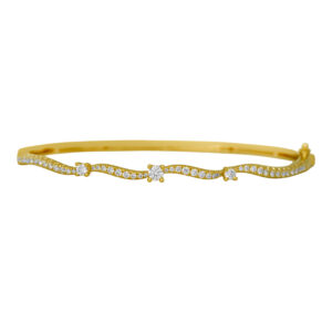 New 18k yellow gold wave bangle set with 0.80 carats of round brilliant earth-mined diamonds.