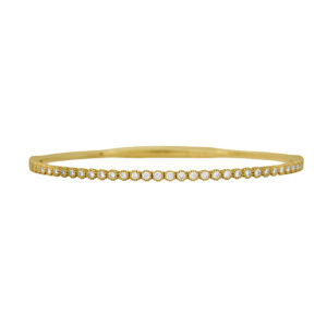 New 14k yellow gold bangle bracelet set with 0.87 carats of round brilliant earth-mined diamonds.