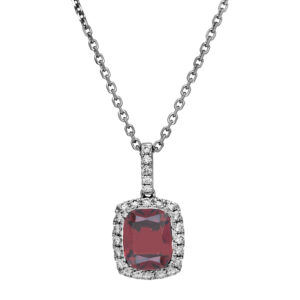 Vintage 14k white gold halo pendant set with a 4.38 carat cushion garnet plus 0.50 carats of round brilliant earth-mined diamonds on an 18" cable chain.
