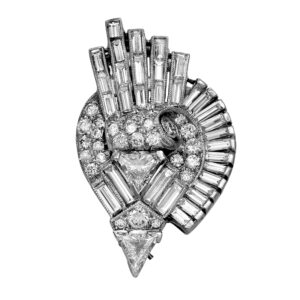 Vintage 14k yellow gold and platinum brooch/pendant set with 8.25 carats of round brilliant, baguette, and trillion earth-mined diamonds.