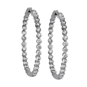 Vintage 14k white gold inside out hoop earrings set with 2.90 carats of round brilliant earth-mined diamonds.