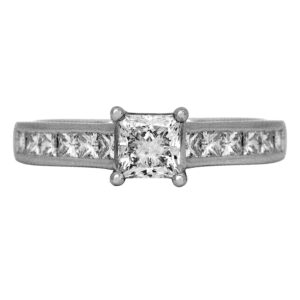 Vintage platinum engagement ring set with a 0.73 carat princess earth-mined diamond plus 0.60 carats of princess earth-mined diamonds.