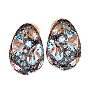 Vintage 18k rose gold Pomellato Tabou earrings set with round brilliant and oval blue topazes.
