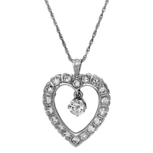Vintage 14k white gold heart pendant set with a 0.47 carat round brilliant earth-mined diamond plus 1.08 carats of single cut earth-mined diamonds on an 18" wheat chain.