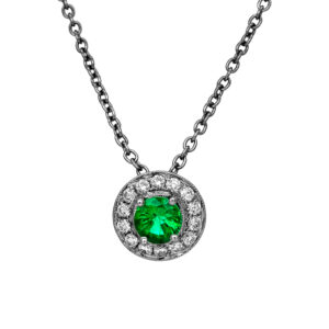 New 18k white gold halo pendant set with a 0.45 carat round brilliant emerald plus 0.20 carats of round brilliant earth-mined diamonds on an 18" cable chain.