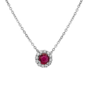 New 18k white gold halo pendant set with a 0.43 carat round brilliant ruby plus 0.18 carats of round brilliant earth-mined diamonds on an 18" cable chain.
