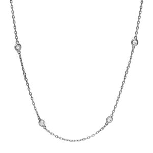 Vintage 14k white gold 18" station necklace set with 0.30 carats of round brilliant earth-mined diamonds.