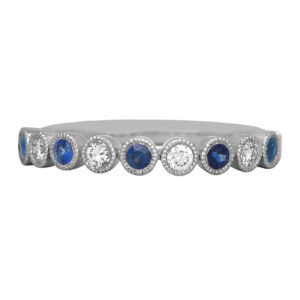 New 14k white gold band set with 0.21 carats of round brilliant blue sapphires plus 0.12 carats of round brilliant earth-mined diamonds.