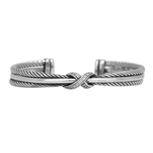 Vintage sterling silver David Yurman Crossover X bangle set with 0.06 carats of round brilliant earth-mined diamonds.