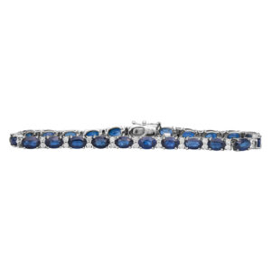 Vintage 14k white gold bracelet set with 11.00 carats of oval sapphires plus 0.97 carats of round brilliant earth-mined diamonds.