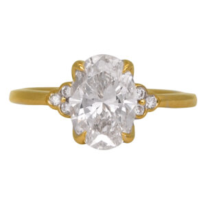 New 14k yellow gold engagement ring set with a 1.00 carat lab-grown oval diamond plus 0.13 carats of lab-grown round brilliant diamonds.