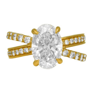New 14k yellow gold engagement ring set with a 3.04 carat lab-grown oval diamond plus 0.92 carats of lab-grown round brilliant diamonds.