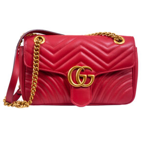 Vintage red leather Gucci GG Marmont handbag with shoulder strap and dust cover.